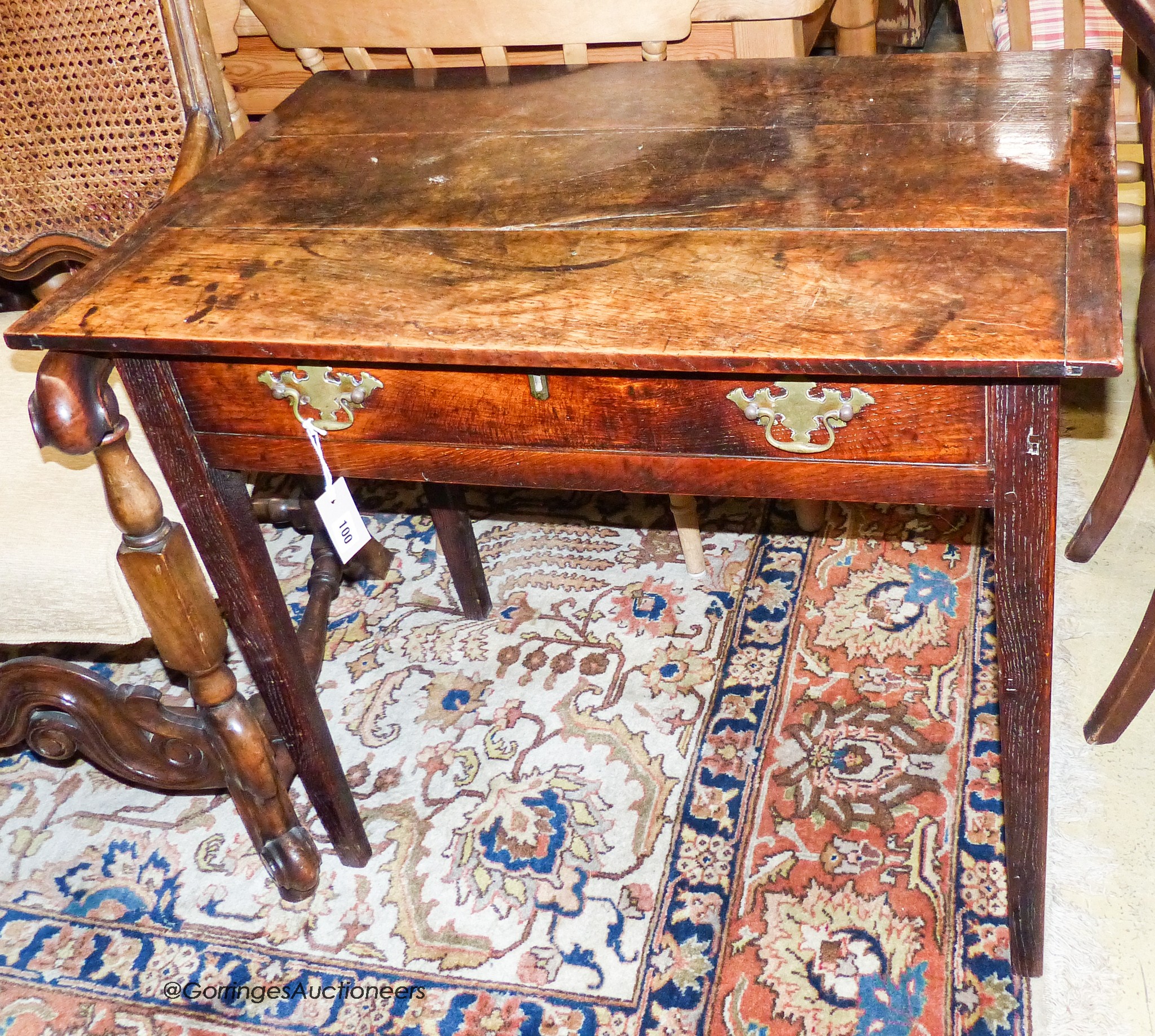 A George III rectangular oak side table fitted frieze drawer, width 83cm, depth 55cm, height 73cm